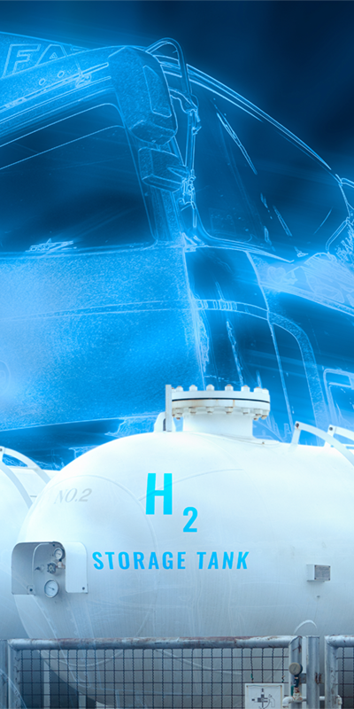 Hydrogen tanks in the foreground with digitally rendered truck in the background illuminated in blue.
