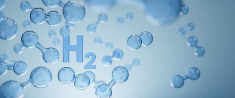 Blaue Wasserstoffmoleküle mit H₂-Schriftzug vor hellem Hintergrund.